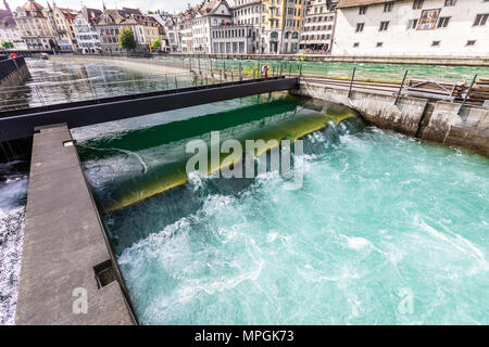 Dam on a mountain blue lake in Lucerne, Switzerland. Stock Photo