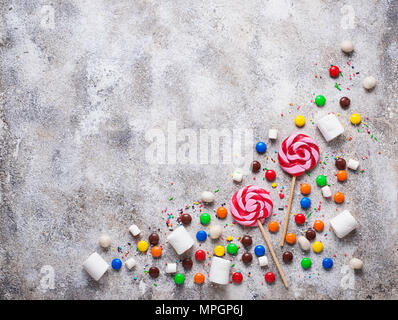 Sweet background with lollipop, candy and  marshmallow  Stock Photo