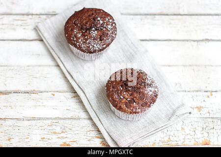 Two chocolate muffin on a fabric napkin Stock Photo