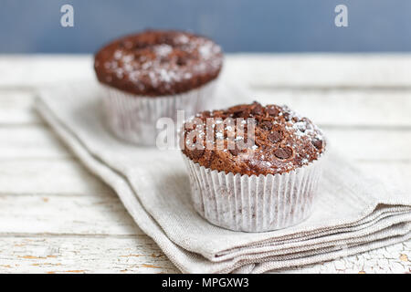Two chocolate muffin on a fabric napkin Stock Photo