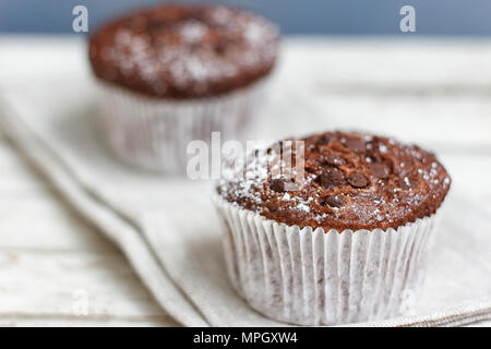 Two chocolate muffin on a fabric napkin Stock Photo