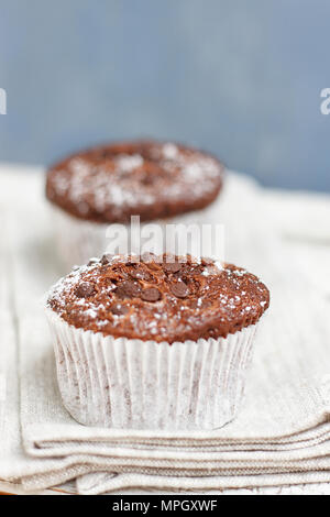 Two chocolate muffin on a fabric napkin Stock Photo