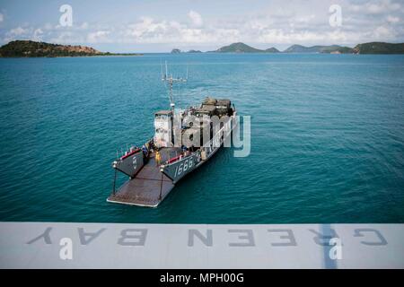 170224-N-JH293-017 SATTAHIP, Thailand (Feb. 24, 2017) Landing craft utility 1666, assigned to Naval Beach Unit 7, prepares to embark the well deck of the amphibious transport dock ship USS Green Bay (LPD 20) during Exercise Cobra Gold 2017. Cobra Gold is the largest Theater Security Cooperation exercise in the Indo-Asia-Pacific region and is an integral part of the U.S. commitment to strengthen engagement in the region. (U.S. Navy photo by Mass Communication Specialist 1st Class Chris Williamson/Released) Stock Photo