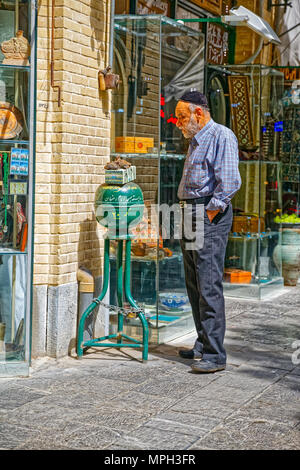 Isfahan man with doves Stock Photo