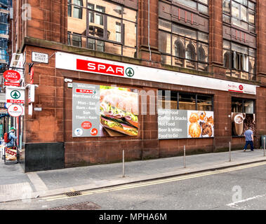 Exterior of the Spar convenience store and post office in the Merchant City area of Glasgow, Scotland, UK Stock Photo