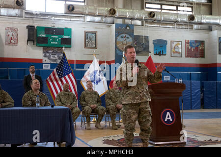 Sgt. Maj. of the Army (Ret.) Kenneth Preston, speaks during the Troops First Foundation’s Operation Proper Exit Hero’s Town Hall in the Area Support Group - Kuwait Morale Warfare Recreation gym in Camp Arifjan, Kuwait, on Mar. 14, 2017. (U.S. Army photo by Staff Sgt. Dalton Smith) Stock Photo