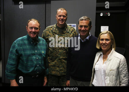 Maj. Gen. Mark Wise, second from left, commanding general of 3rd Marine Aircraft Wing, poses with members from the American Academy of Orthopaedic Surgeons (AAOS) at Marine Corps Air Station Miramar, Calif., March 15. AAOS surgeons and their spouses exchanged best medical practices with their counterparts and flew in four flight simulators while learning about the different aircraft with 3rd MAW. (U.S. Marine Corps photo by Sgt. David Bickel/Released) Stock Photo