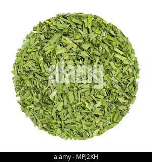 Dried chives. Herb circle from above, isolated, over white. Disc made of chopped chives. Allium schoenoprasum. Green herb, made of the leaves. Stock Photo