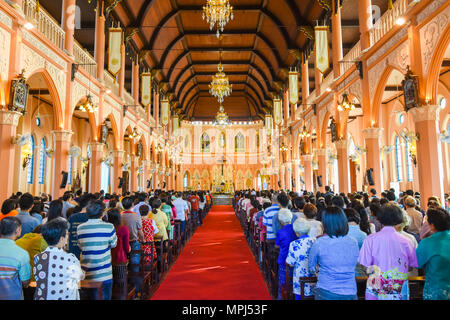 Chantaburi, Thailand - January 1, 2016: Group of pastors doing religion ceremony  while Chistian people standing to attend religion ceremony in occasi Stock Photo