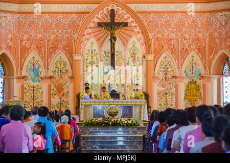 Chantaburi, Thailand - January 1, 2016: Group of pastors doing religion ceremony  while Christian people standing to attend religion ceremony in occas Stock Photo