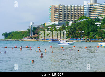 Pattaya, Thailand - Mar 30,2018 : unidentified people come to travelling and playing on Pattaya beach at Chonburi, Thailand Stock Photo