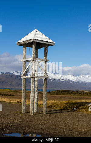 Búlandstindur is a mountain in Eastern Iceland between the bays Berufjörður and Hamarsfjörður. It is a pyramid-shaped stack of basaltic strata Stock Photo