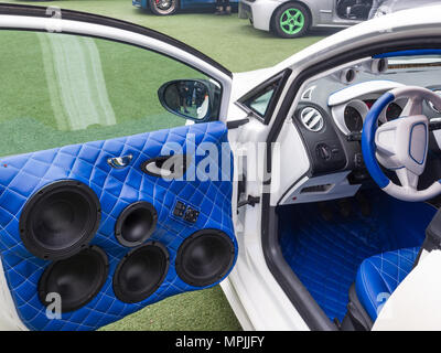 white car with interior upholstered in blue leather and powerful stereophonic system Stock Photo