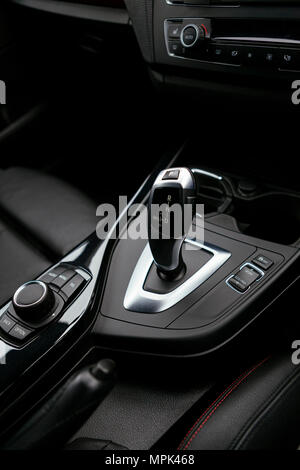 Car interior focusing on automatic gear shift stick Stock Photo