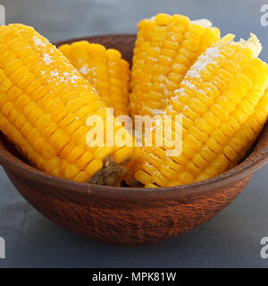 Corn on the cob in a bowl ready to be served. Stock Photo