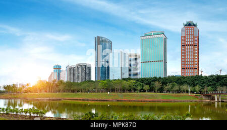 China Haikou Cityscape, high-rise by the lake. Stock Photo