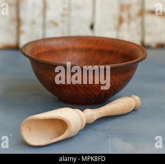 Stack of Colorful Bowls on Wooden Background Stock Photo