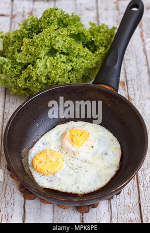 Premium Photo  Fried egg in small cast-iron skillet