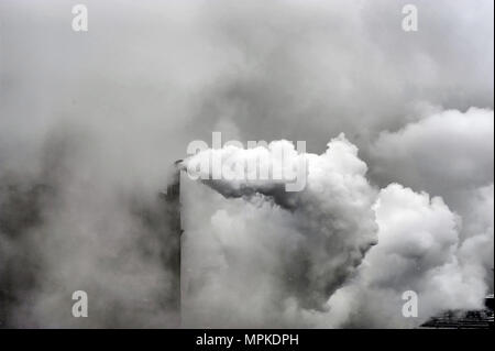 Smoke of heavy industry is highlighted Stock Photo