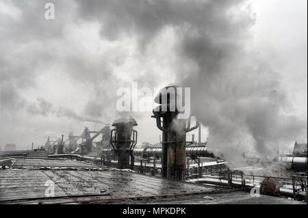 Smoke of heavy industry is highlighted Stock Photo