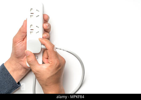 man hand plugging the electric power socket bar white color isolate. save energy and reduce energy efficiency concept Stock Photo