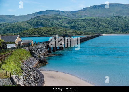 The rail bridge over the Mawddach estuary ar Barmouth Gwynedd North Wales UK. Stock Photo