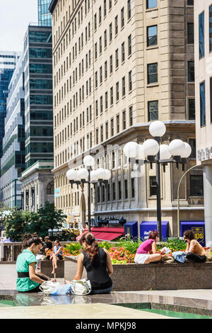 Montreal Canada,Quebec Province,Avenue McGill College,school,campus,Place Ville Marie,women,lunchtime,urban park,office buildings,city skyline citysca Stock Photo