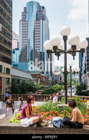 Montreal Canada,Quebec Province,Avenue McGill College,school,campus,Place Ville Marie,women,lunchtime,urban park,office buildings,city skyline,Canada0 Stock Photo