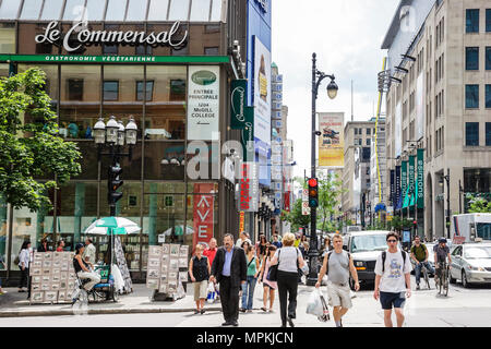Canada,Canadian,Quebec Province,French language,bilingual speaking,Montreal,Rue Saint Catherine Ouest,district,pedestrians cross intersection,Canada07 Stock Photo