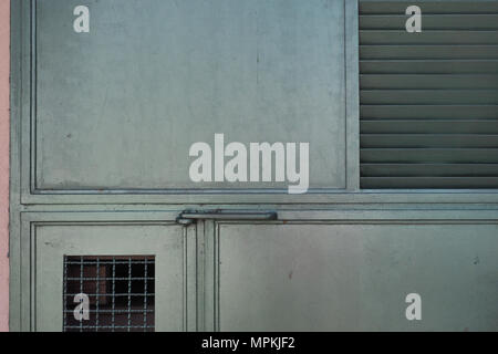 Abstract background of gentle light green color metal wall with bars. Stock Photo