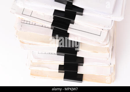 Paper stack storage and Black Paper Clip pace on white isolated background Stock Photo