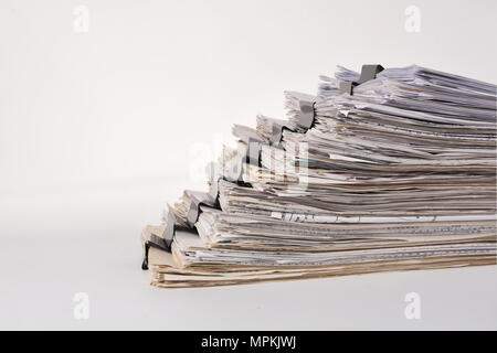 Paper stack storage and Black Paper Clip pace on white isolated background Stock Photo