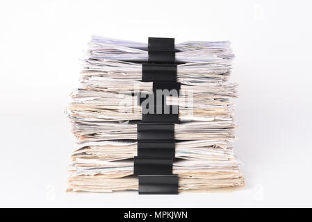 Paper stack storage and Black Paper Clip pace on white isolated background Stock Photo