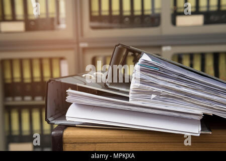 Files stack on the desk in the office. Stock Photo