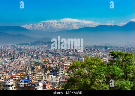 View over Kathmandu and the Himalaya mountain range from Kirtipur, Nepal Stock Photo