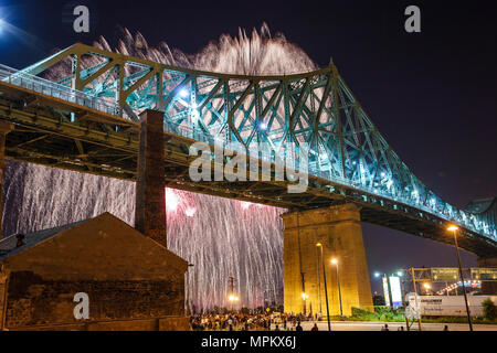Montreal Canada,Quebec Province,Rue Notre Dame,Pont Jacques Cartier,bridge,International Fireworks Competition,St. Lawrence River water,visitors trave Stock Photo
