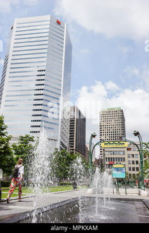 Montreal Canada,Quebec Province,Square Victoria,public fountain,office buildings,city skyline,RESO Underground City entrance,urban park,Canada07070802 Stock Photo