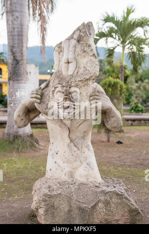 Carved stone located in the Central Park in town of Copan Ruinas in Honduras. Stock Photo