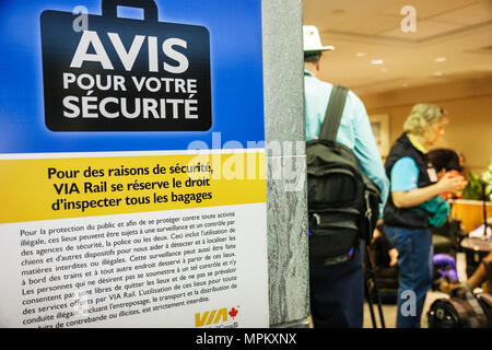 Montreal Canada,Quebec Province,Gare Centrale,Central Train Station,passenger passengers rider riders,sign,logo,security baggage inspection,visitors t Stock Photo