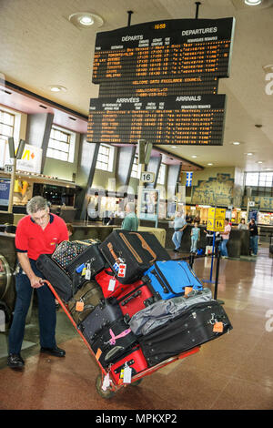 Montreal Canada,Quebec Province,Gare Centrale,Central Train Station,schedule,ticketing,porter,luggage,suitcase cart,Canada070708100 Stock Photo