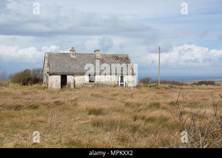 Derelict Cottage in the Irish Countryside in County Clare on the Atlantic West Coast of Ireland Stock Photo