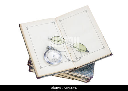 Old books, watch with eye-glasses Stock Photo