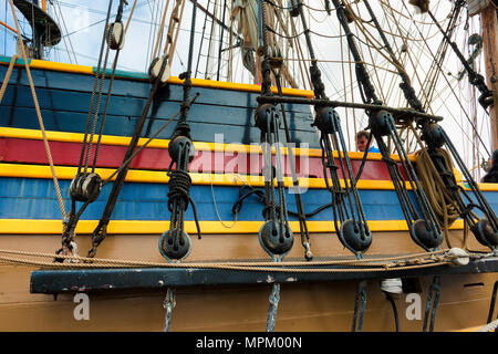 Newport, Oregon,USA - May 25, 2016: Closeup of tall ship Lady Washington's rigging on starboard side. Stock Photo