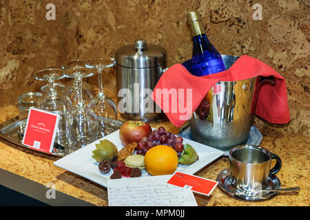 Quebec Canada,Lower Town,Auberge Saint Antoine,hotel,fruit plate,dessert,bottled water,hospitality,Canada070712163 Stock Photo