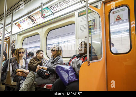 Toronto Canada,TTC subway,Bloor Green Line,public transportation,train interior,passenger passengers rider riders,commuter,commuters,Black Blacks Afri Stock Photo