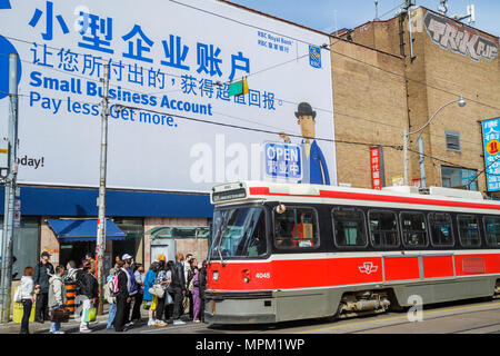 Toronto Canada,Dundas Street,Chinatown,Toronto Transit Commission,TTC,mass transit,streetcar,trolley,RBC Royal Bank,banking,billboard,advertisement,ad Stock Photo