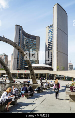 Toronto Canada,Nathan Phillips Square,City Hall,building,municipal government,modern,Architect Viljo Revell,Freedom Arches,reflecting pool. fountain,p Stock Photo