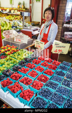 Raspberries fruit selling at farmers market closeup overhead from above ...