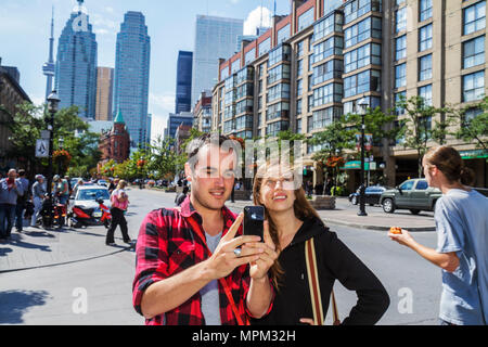 Toronto Canada,Front Street East,street scene,high rise skyscraper skyscrapers building buildings condominium residential apartment apartments housing Stock Photo