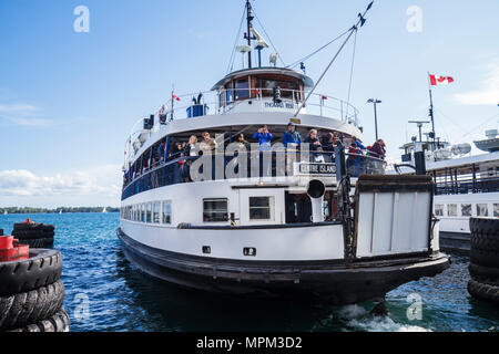 Toronto Canada,Queen's Quay West,Toronto Island Islands ferries,ferry,boat,Centre Island,Thomas Rennie,Lake Ontario,ticket kiosk,passenger passengers Stock Photo